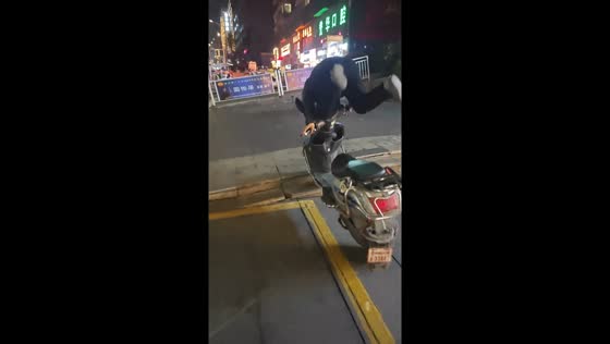 Motorcyclist thrown off bike after hitting stairs in Guizhou, China